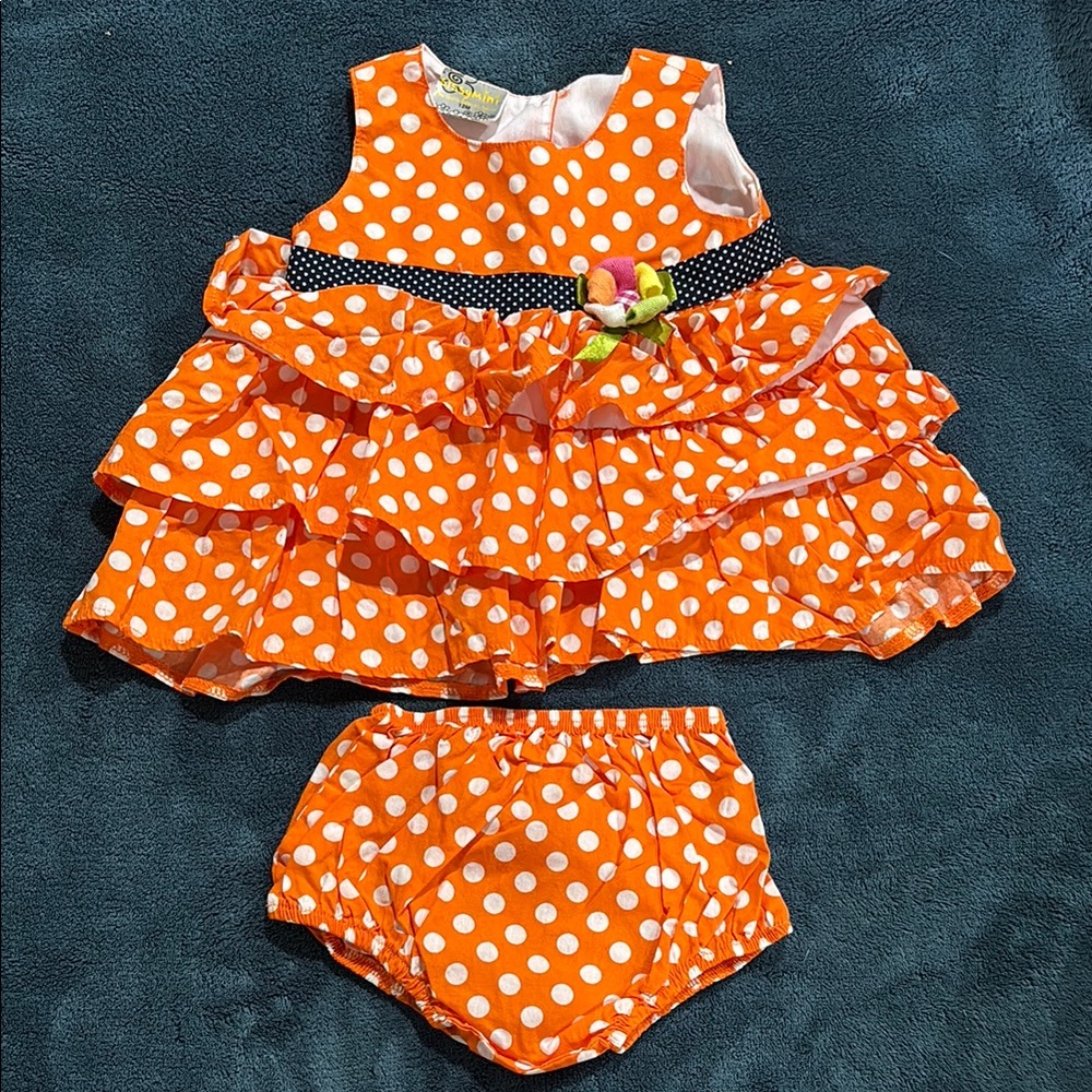 Orange Polka Dot Dress with beautiful flower embellishment. Size 12 months